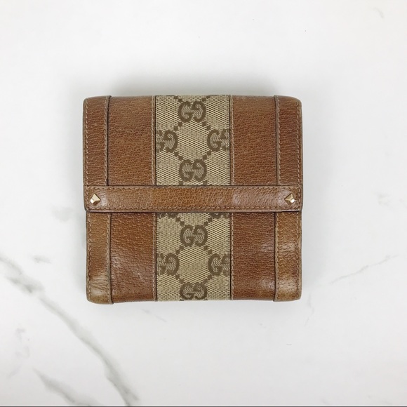 Gucci Handbags - Gucci Brown Leather Monogram Canvas Snap Wallet